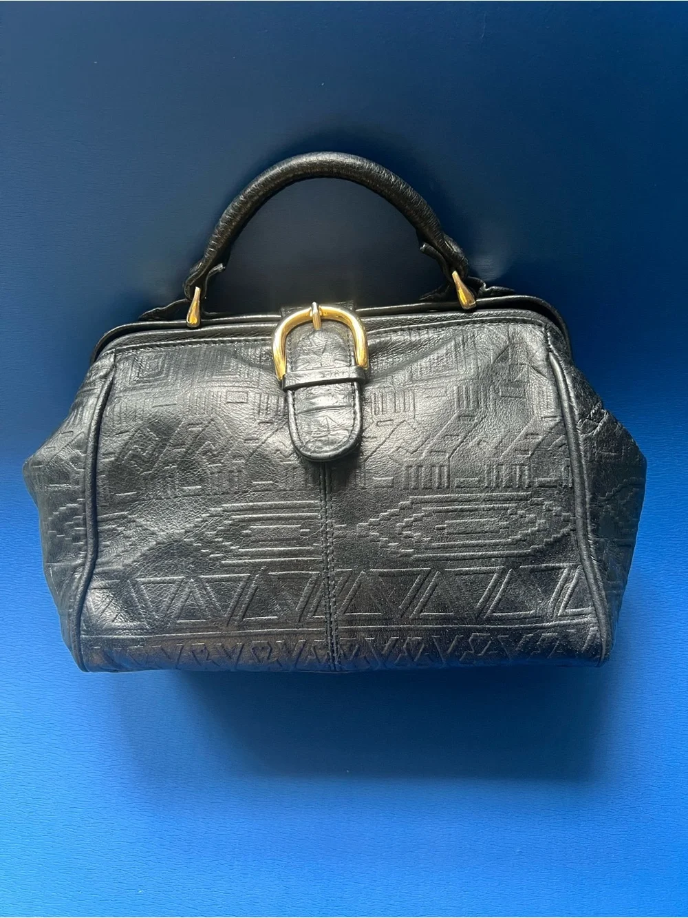 Black Embossed Leather Top-Handle Bag with Gold Buckle